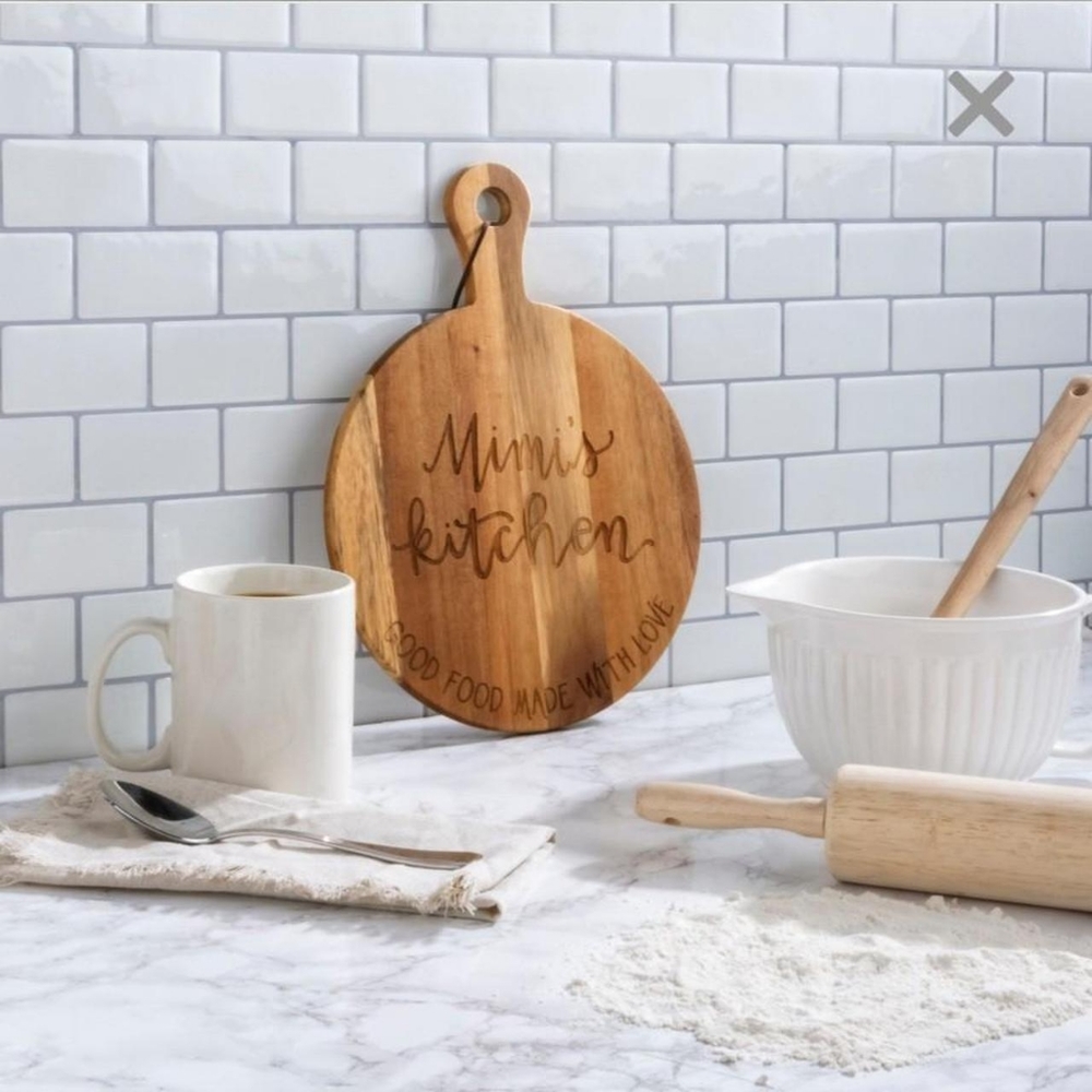 "Mimi's Kitchen" Round Cutting Board With Handle and Leather Piece To Hang